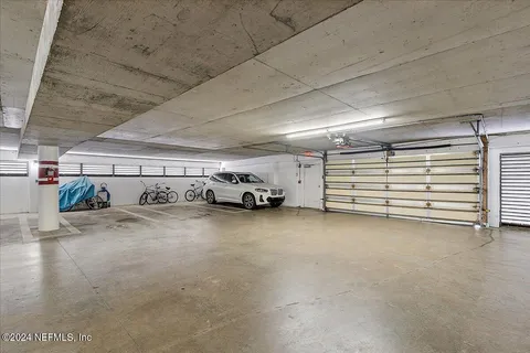 a kitchen with stainless steel appliances granite countertop a refrigerator sink and stove