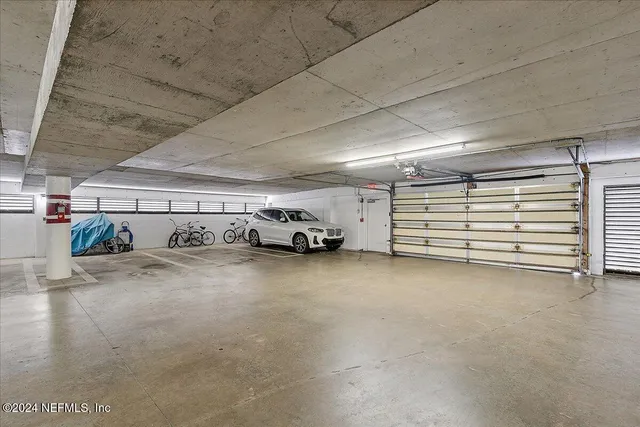 a kitchen with stainless steel appliances granite countertop a refrigerator sink and stove