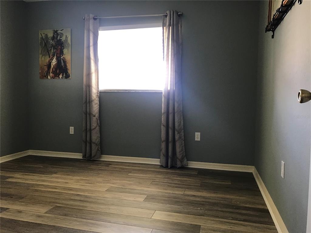 11879 Southwest 137th Loop Dunnellon, FL 34432 - Photo 18 of 37 a view of an empty room