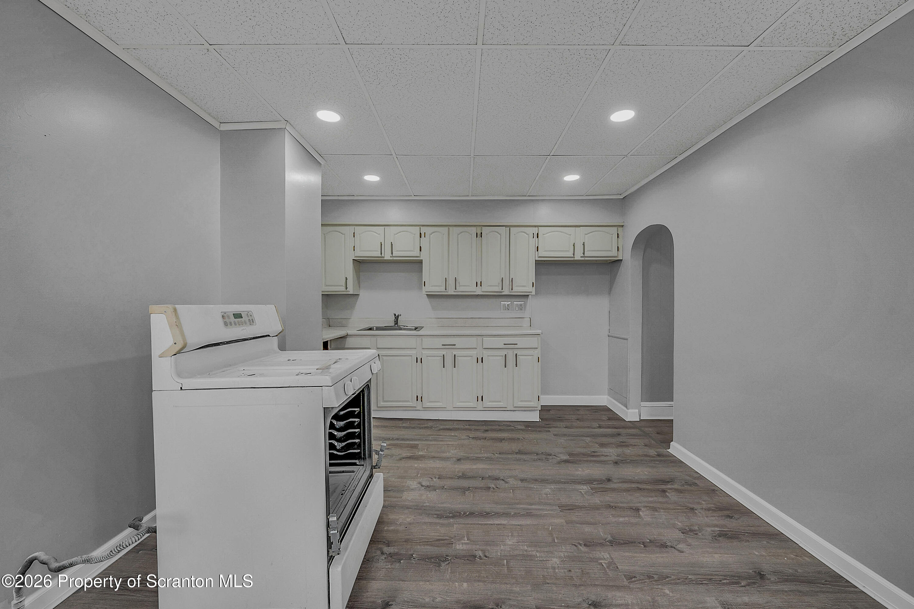 8 Green Ridge Street, Unit 2 Scranton, PA 18509 - Photo 15 of 18 a kitchen with a stove a refrigerator and a sink