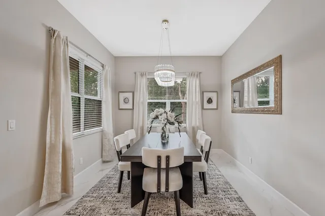 a kitchen with stainless steel appliances a sink stove and refrigerator