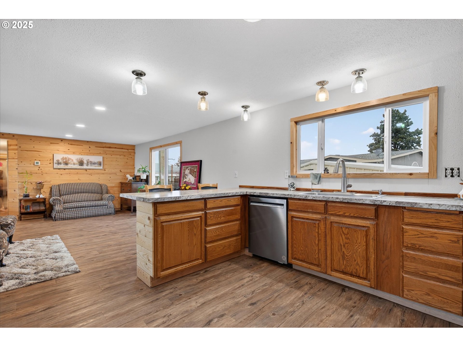 2637 14th Street Baker City, OR 97814 - Photo 5 of 19 a kitchen with lots of counter top space and wooden floor