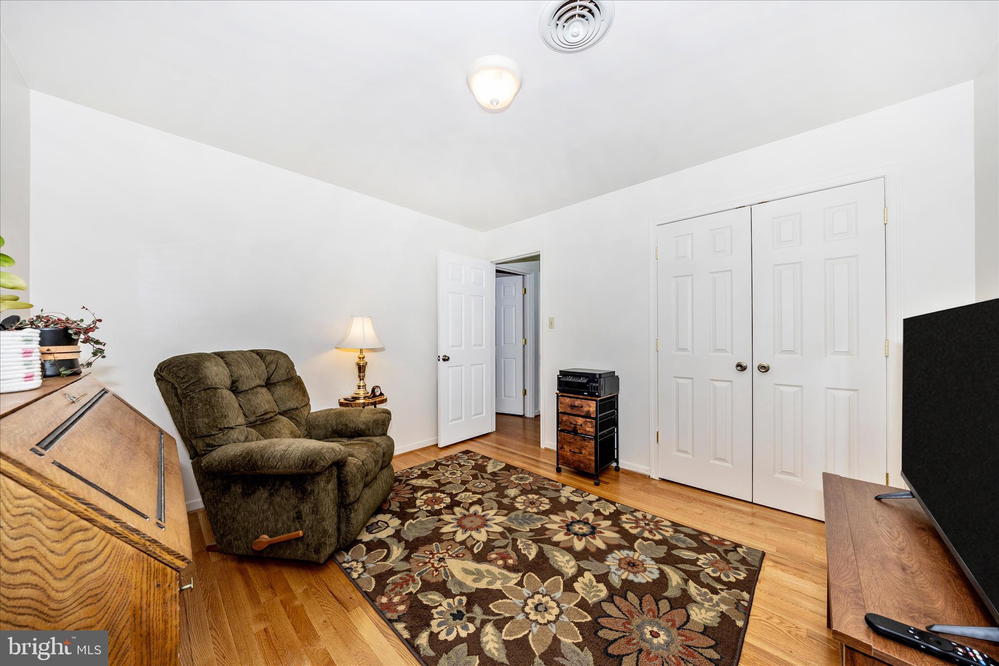 4432 Valley View Road Middletown, MD 21769 - Photo 24 of 54 a living room with furniture and a flat screen tv