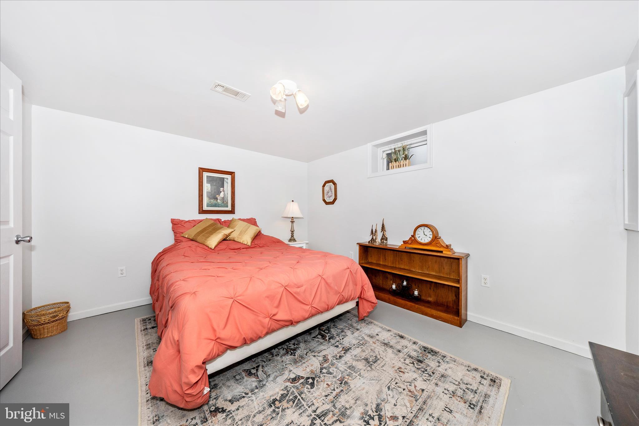 4432 Valley View Road Middletown, MD 21769 - Photo 31 of 54 a bed room with a bed and a couch