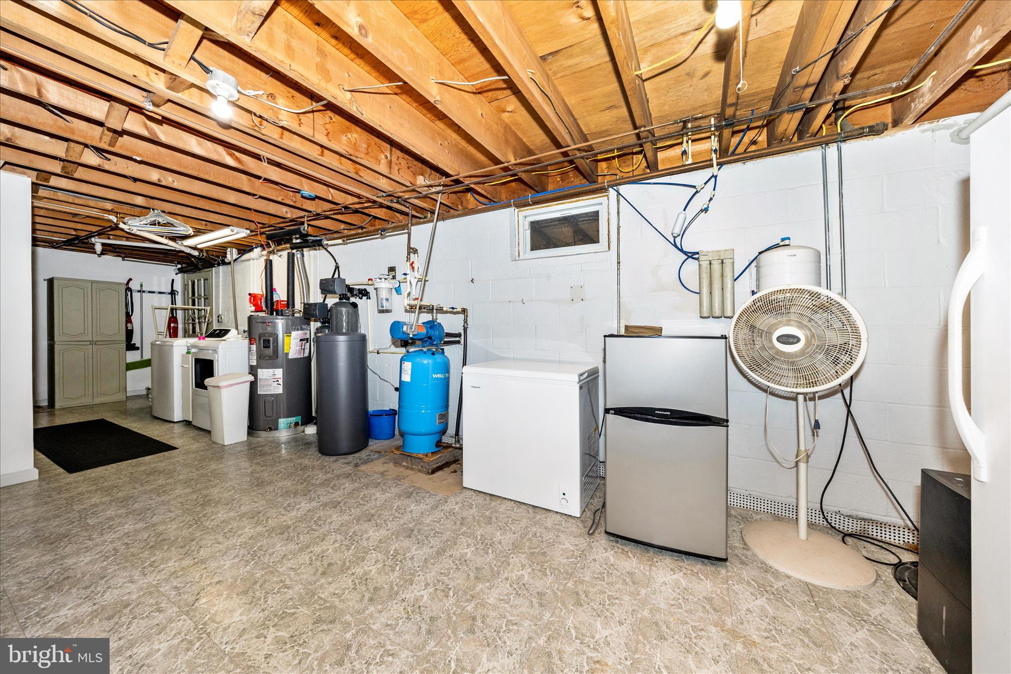 4432 Valley View Road Middletown, MD 21769 - Photo 35 of 54 a view of a storage & utility room with washer and dryer