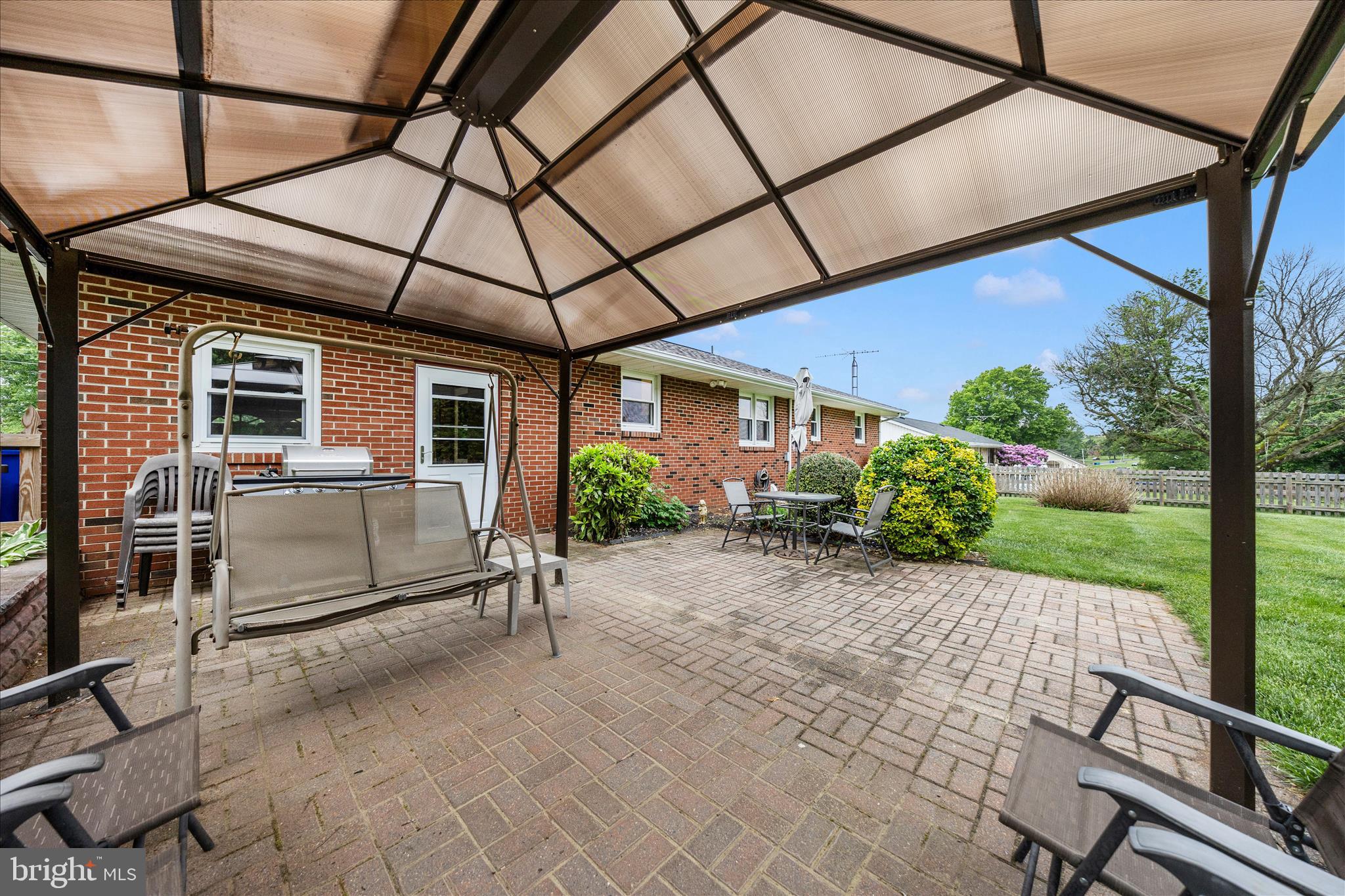 4432 Valley View Road Middletown, MD 21769 - Photo 52 of 54 a patio with a table and chairs and potted plants