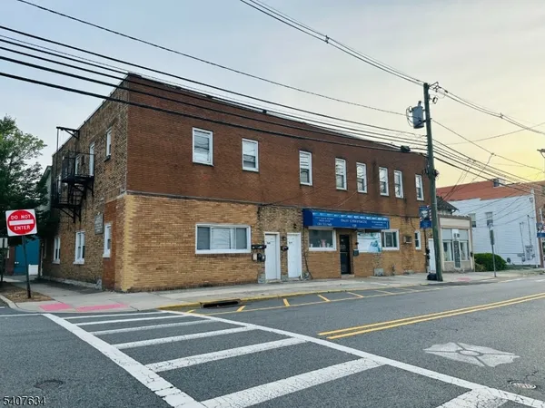 a view of a building with a street