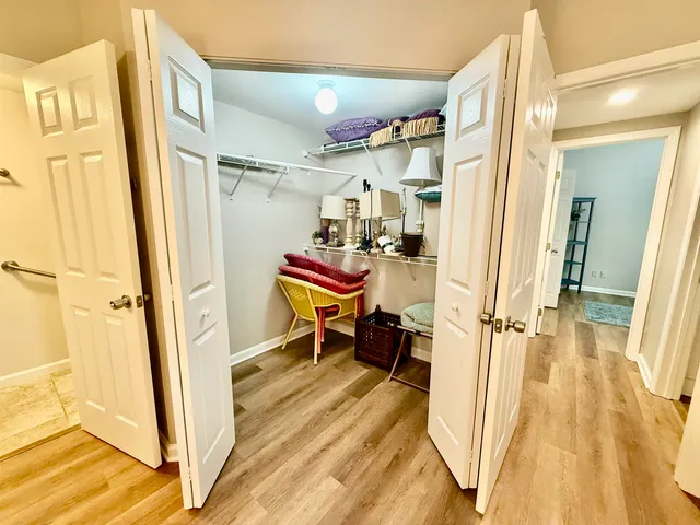a bathroom with a sink a vanity and a mirror
