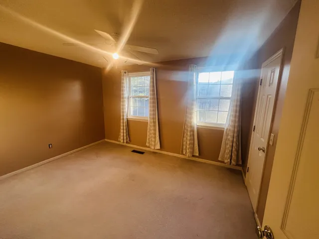 an empty room with window