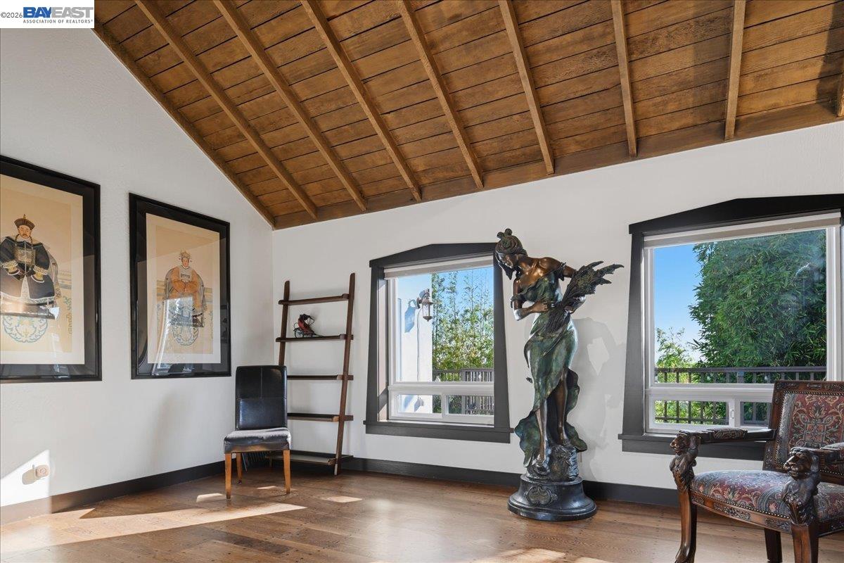 22111 Prospect Street Hayward, CA 94541 - Photo 4 of 70 a view of a livingroom with furniture wooden floor and a floor to ceiling window