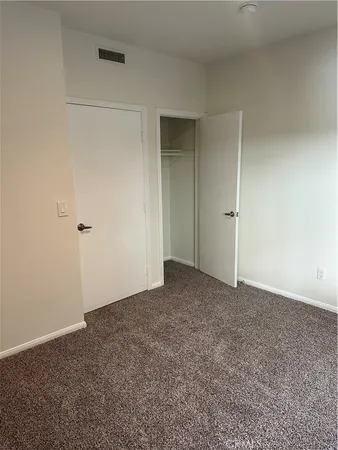 a view of a balcony with door