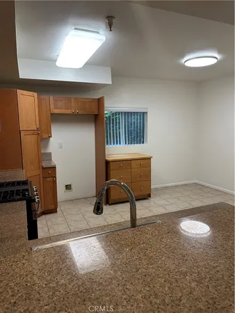 a room with furniture and natural light