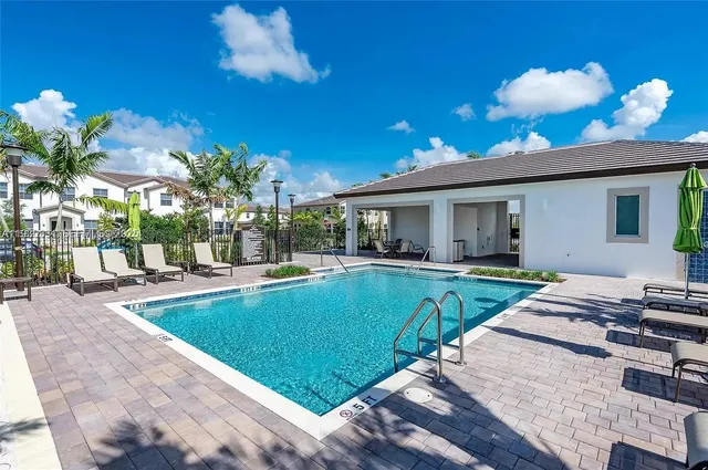 a picture of a bathroom with a shower