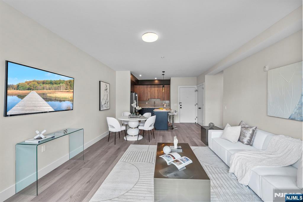 2021 Jones Road, Unit 102 Fort Lee, NJ 07024 - Photo 3 of 11 a living room with furniture