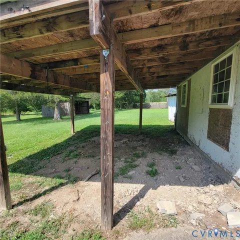 a view of a backyard with a tub