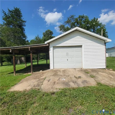 a view of a backyard with a garden