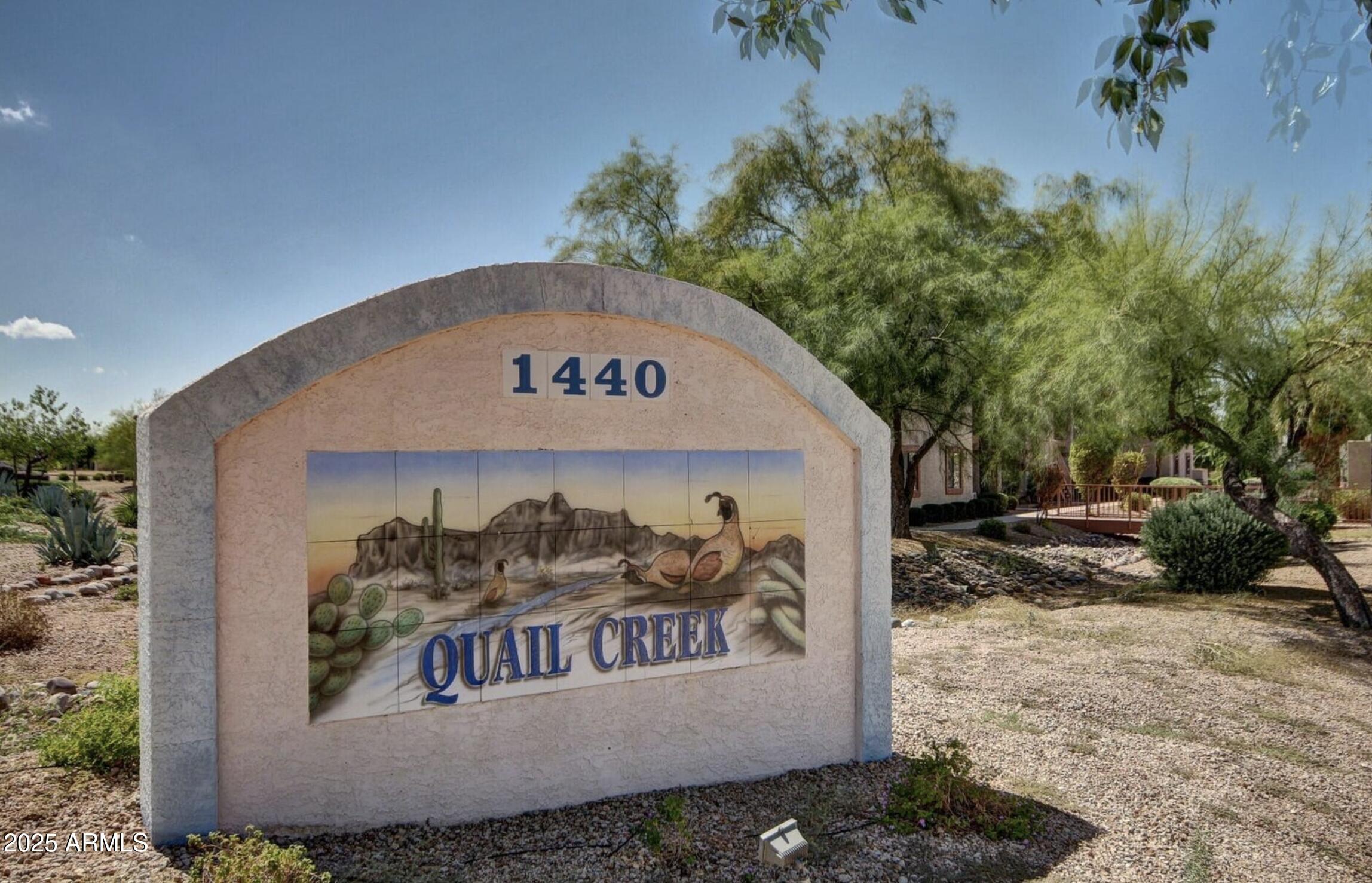 1440 North Idaho Road, Unit 1021 Apache Junction, AZ 85119 - Photo 15 of 24 a sign on the side of the road