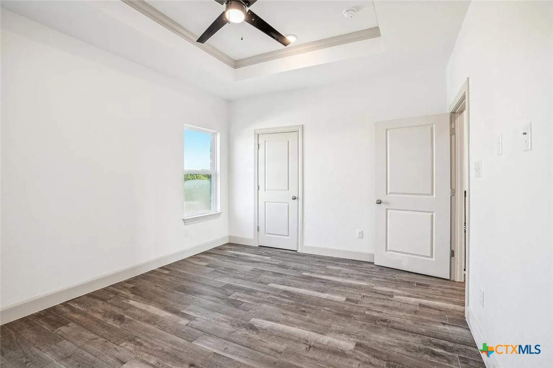 289 Star Grass, Unit 3 Spring Branch, TX 78070 - Photo 21 of 40 wooden floor in an empty room