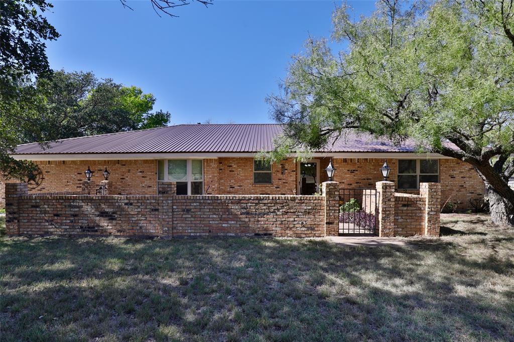 448 Elmdale Road South Abilene, TX 79602 - Photo 1 of 39 a front view of a house with garden