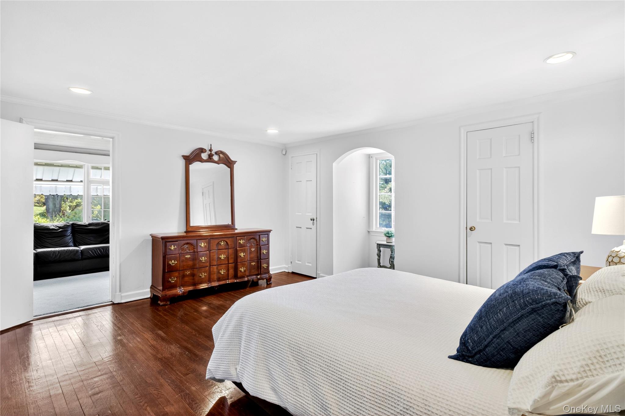 60 Mill Spring Road Manhasset, NY 11030 - Photo 11 of 18 a bedroom with a bed and a dresser