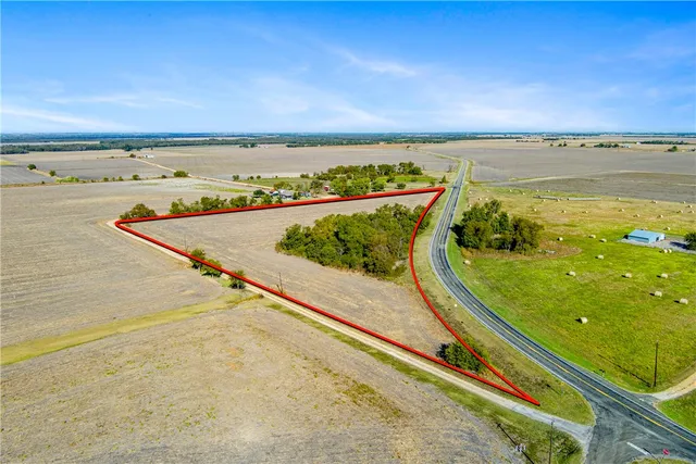 an aerial view of beach and city space