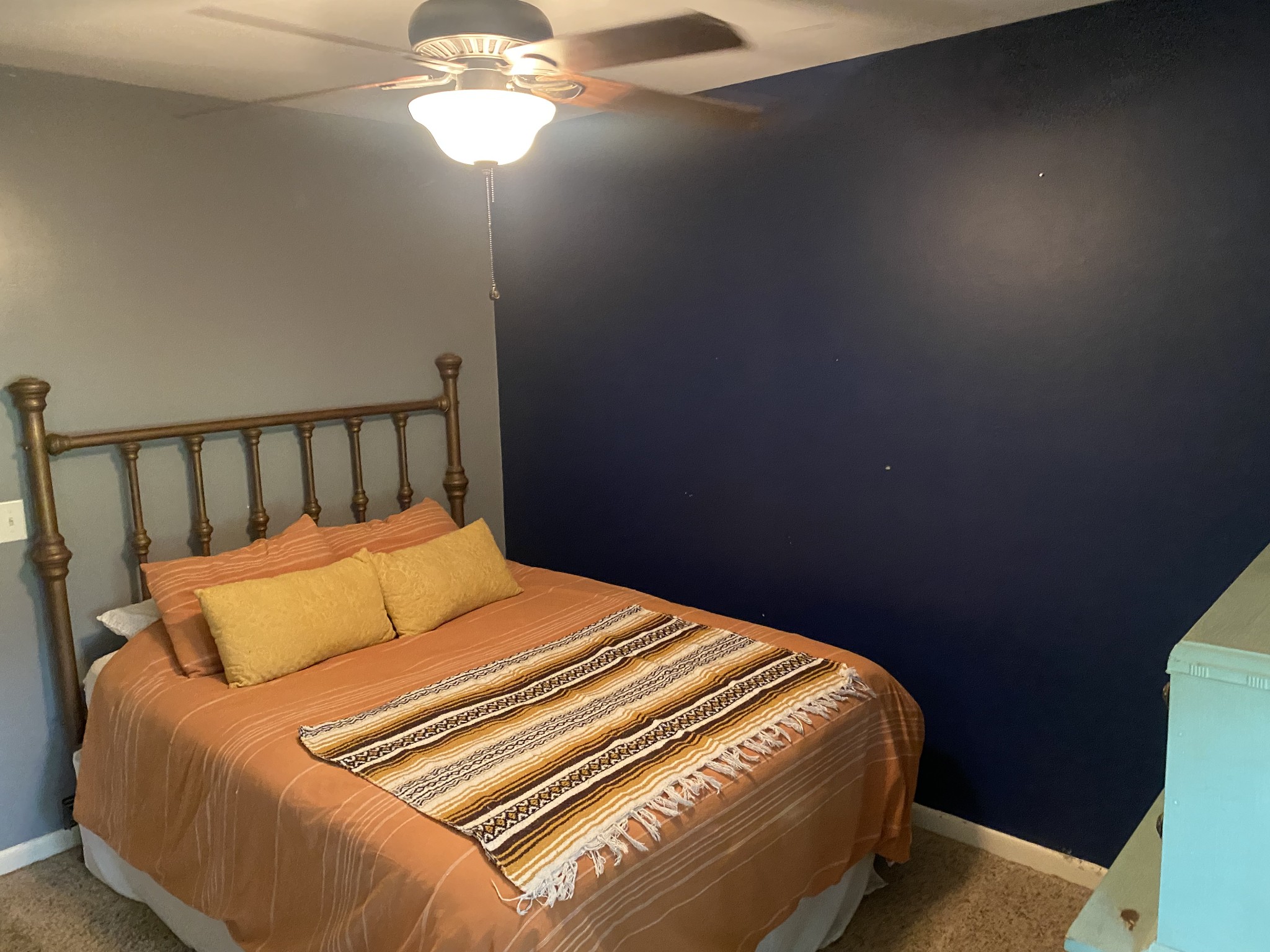 7305 Bethshears Road Fairview, TN 37062 - Photo 17 of 41 a bedroom with a bed and a chandelier