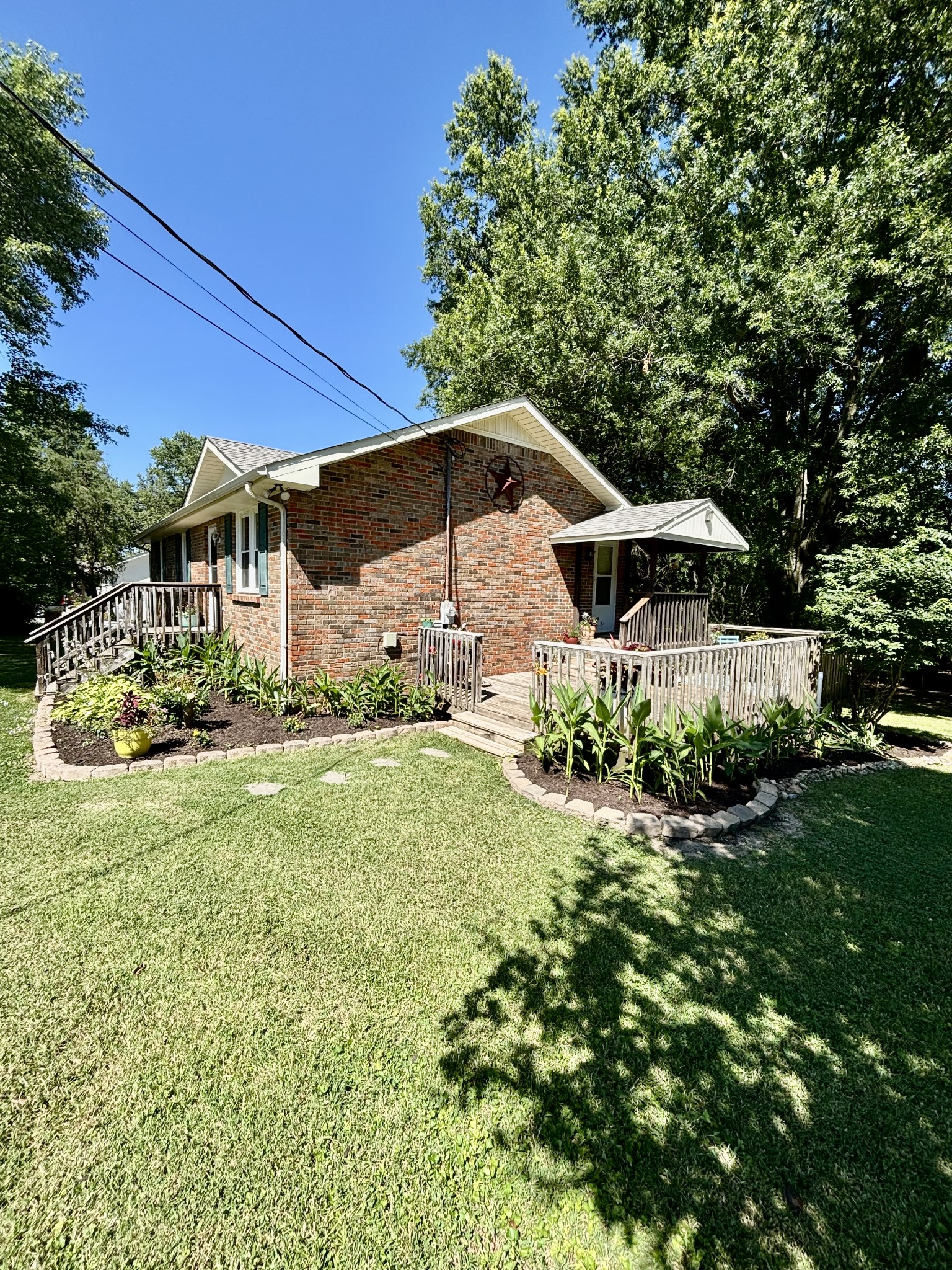 7305 Bethshears Road Fairview, TN 37062 - Photo 2 of 41 a front view of a house with a yard