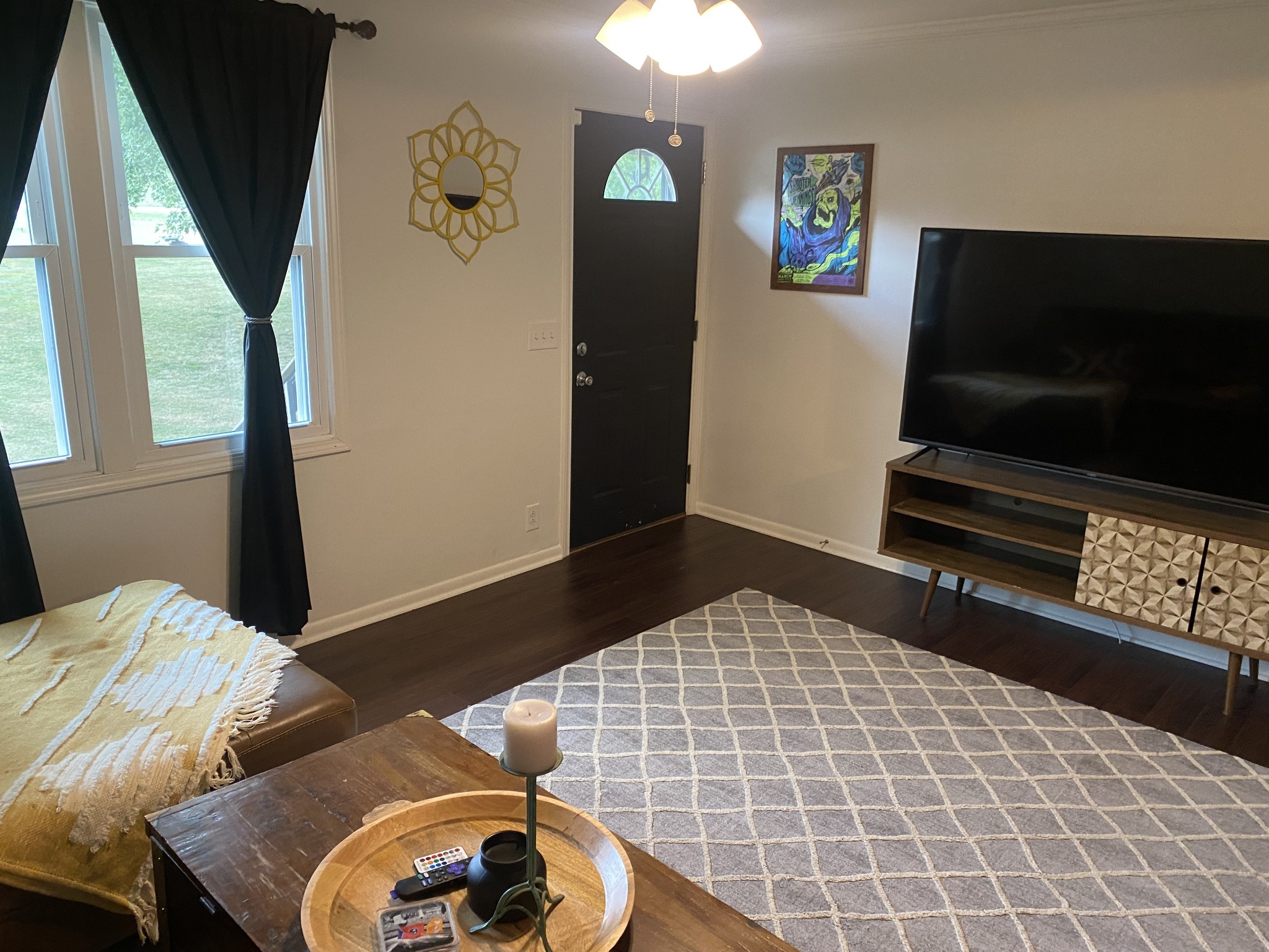 7305 Bethshears Road Fairview, TN 37062 - Photo 3 of 41 a bedroom with a bed and a flat screen tv