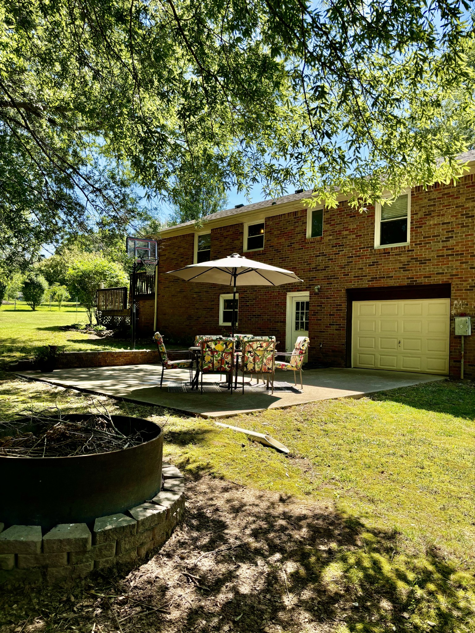 7305 Bethshears Road Fairview, TN 37062 - Photo 34 of 41 a front view of a house with swimming pool having outdoor seating