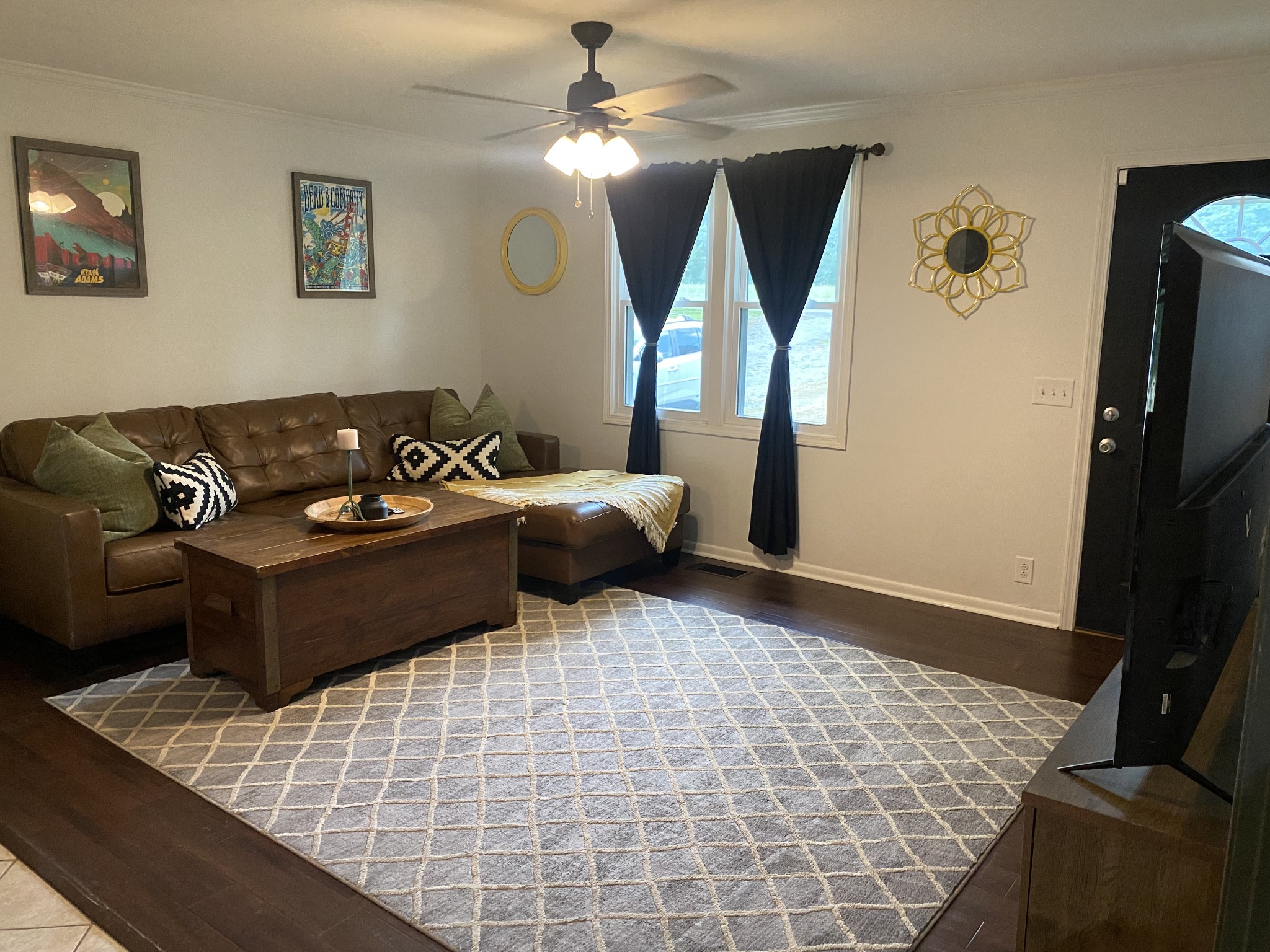 7305 Bethshears Road Fairview, TN 37062 - Photo 4 of 41 a living room with furniture and a flat screen tv