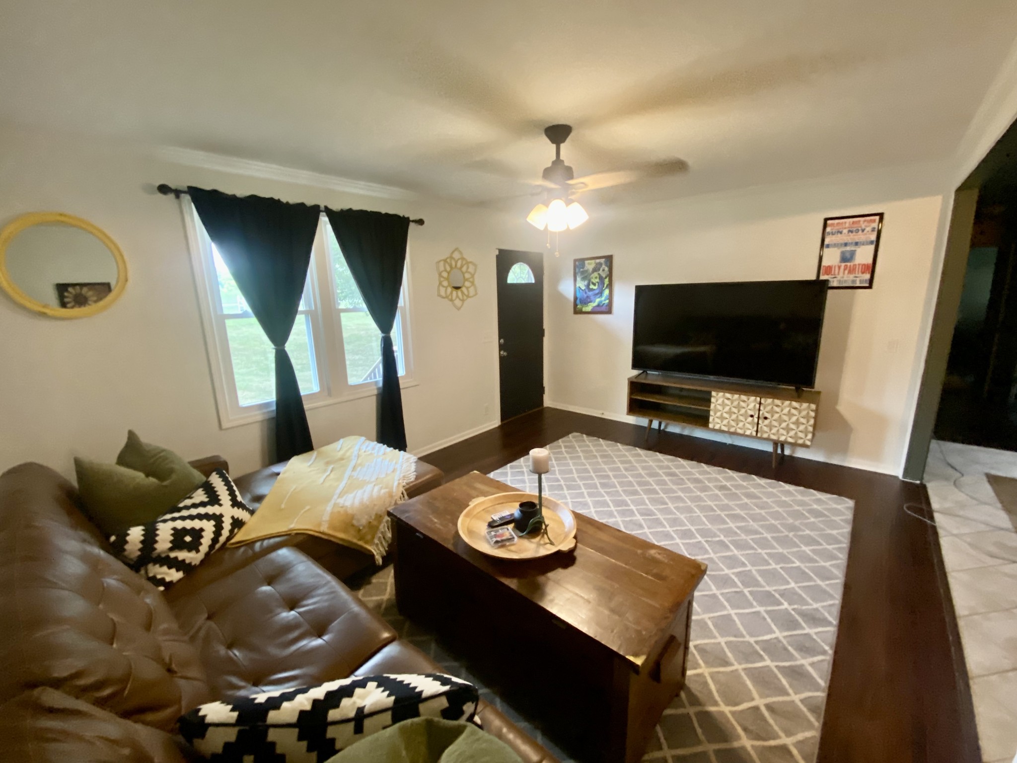 7305 Bethshears Road Fairview, TN 37062 - Photo 7 of 41 a living room with furniture and a flat screen tv