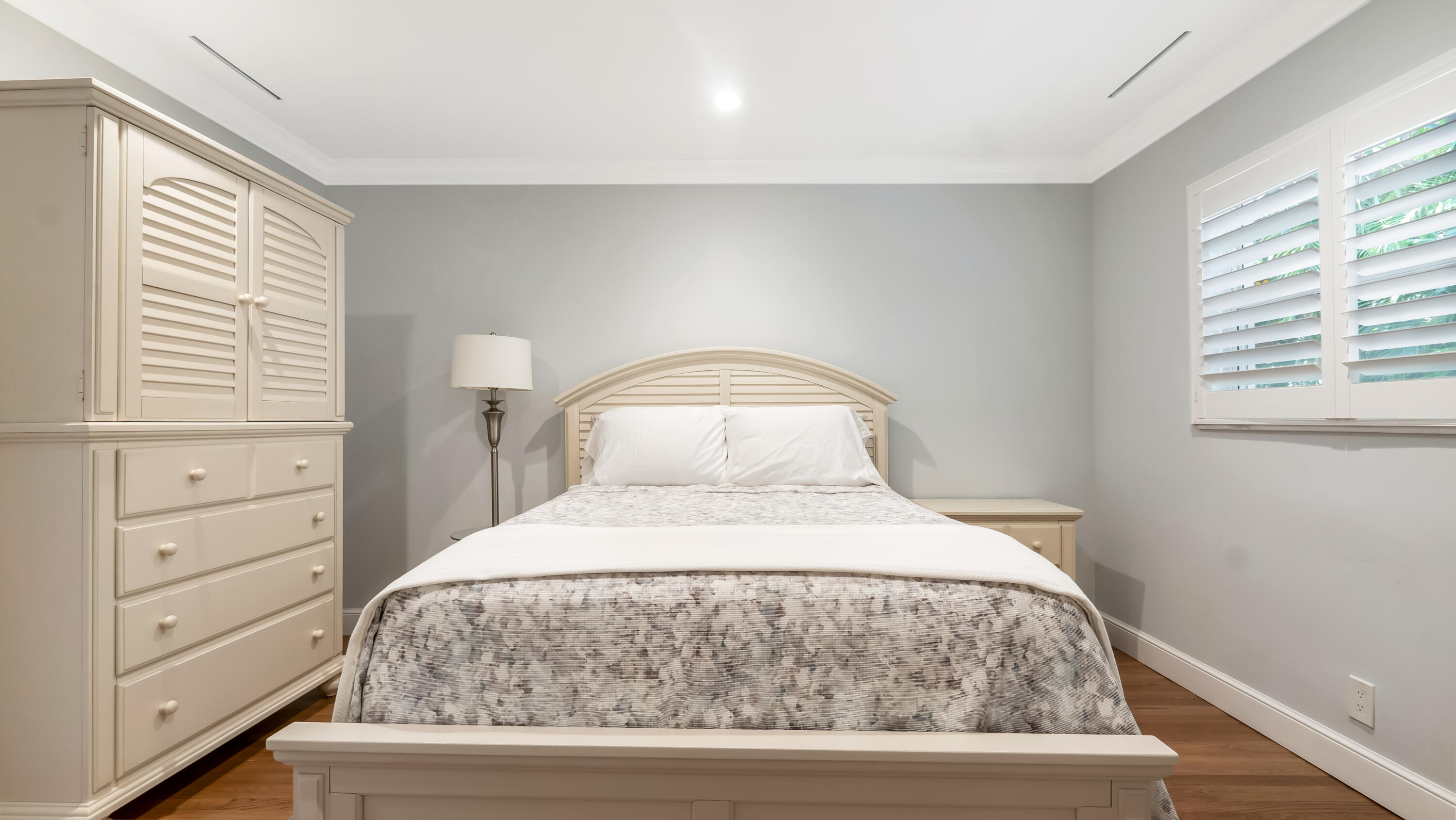 831 Dover Street Boca Raton, FL 33487 - Photo 31 of 54 a bedroom with a bed and a window