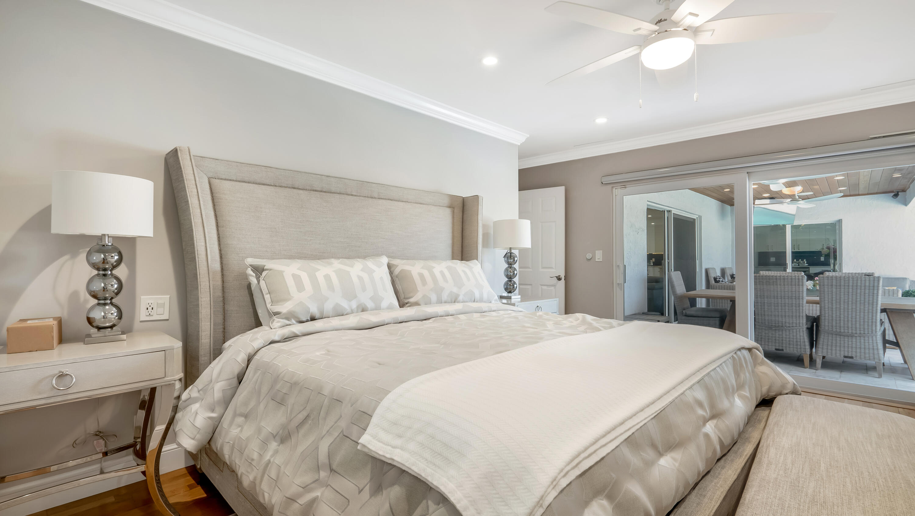 831 Dover Street Boca Raton, FL 33487 - Photo 39 of 54 a bedroom with a bed and a lamp