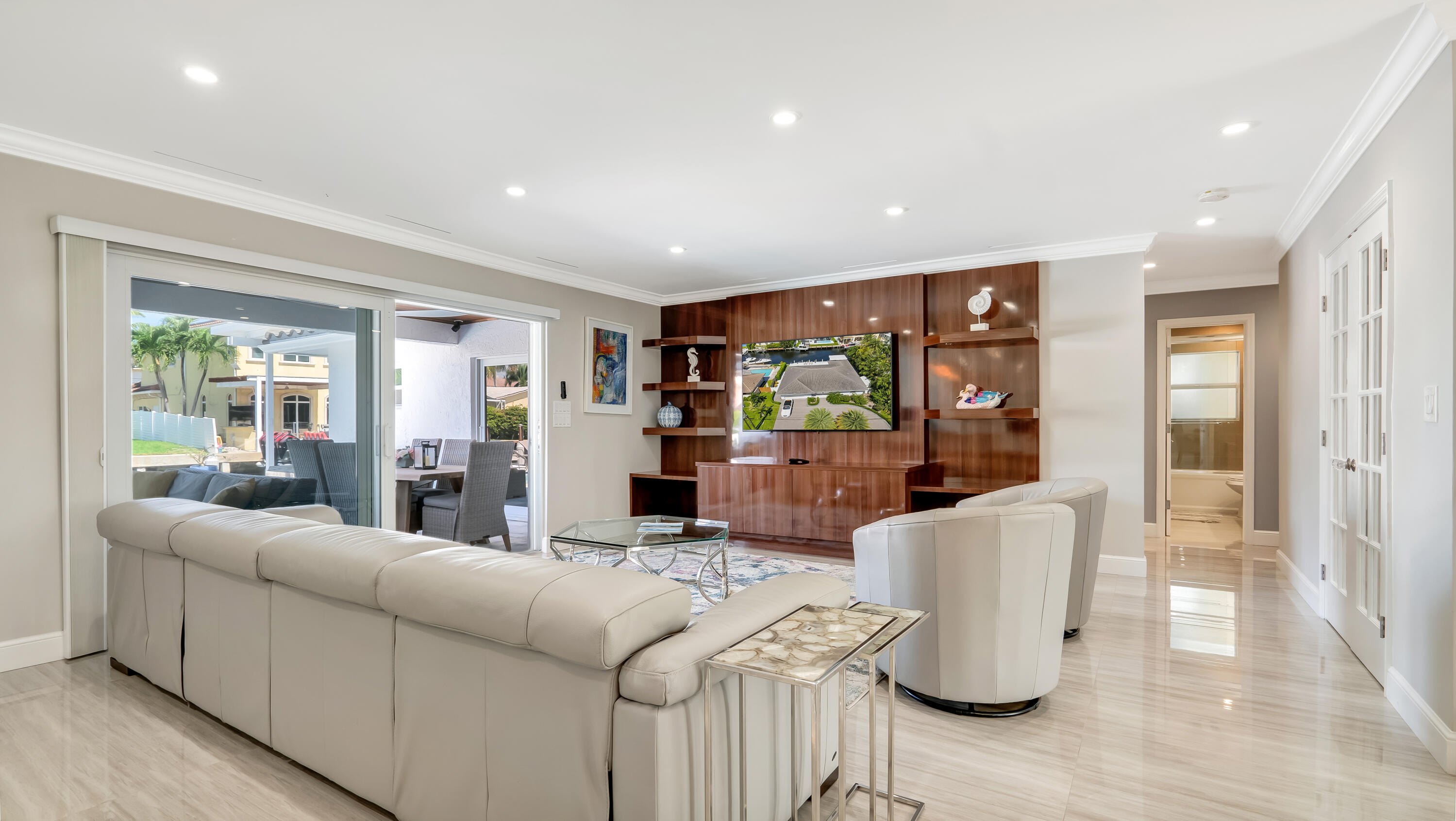 831 Dover Street Boca Raton, FL 33487 - Photo 10 of 54 a living room with furniture and a large window