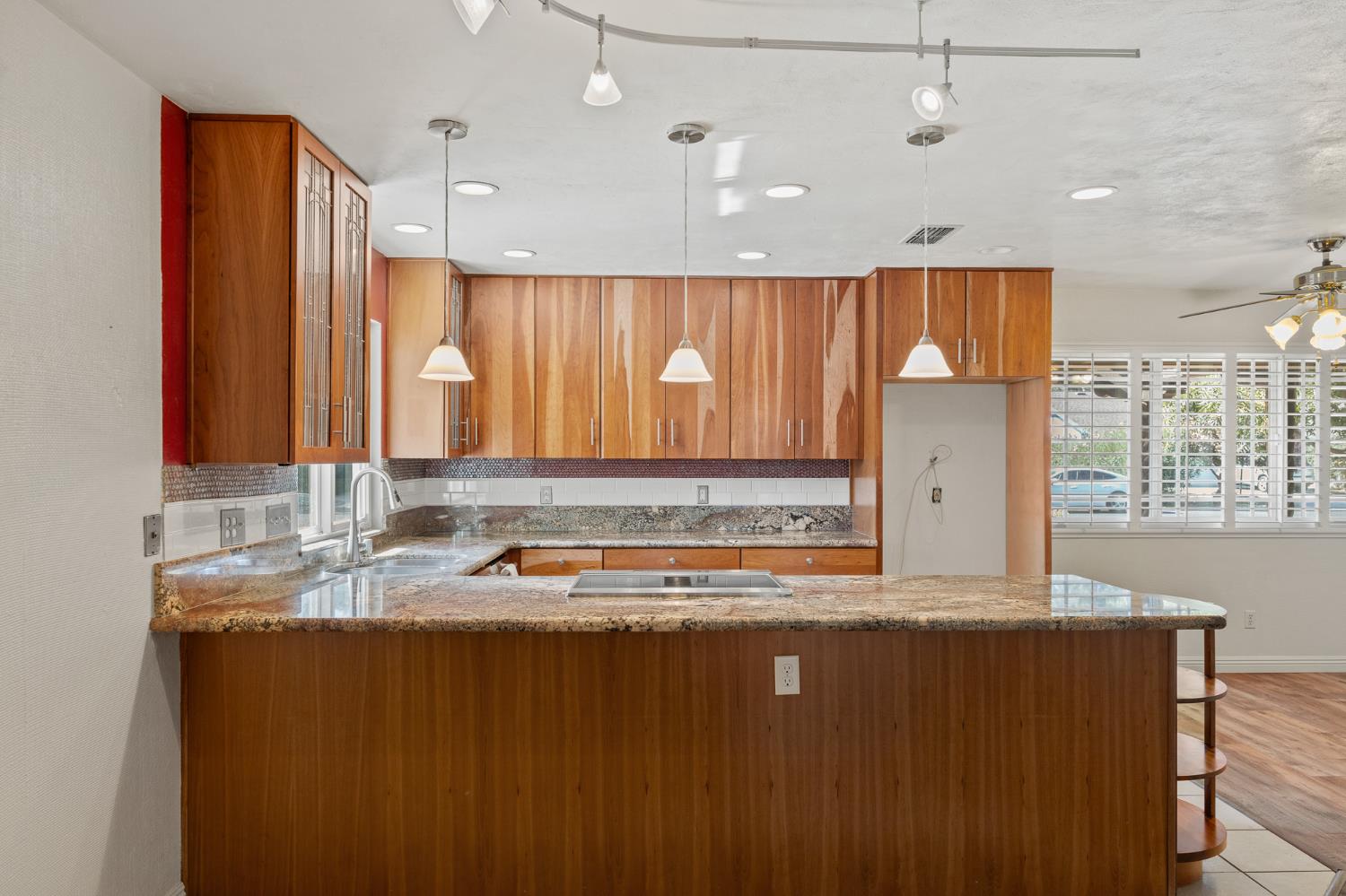 2179 Rall Avenue Clovis, CA 93611 - Photo 14 of 54 a kitchen with a large window appliances and cabinets