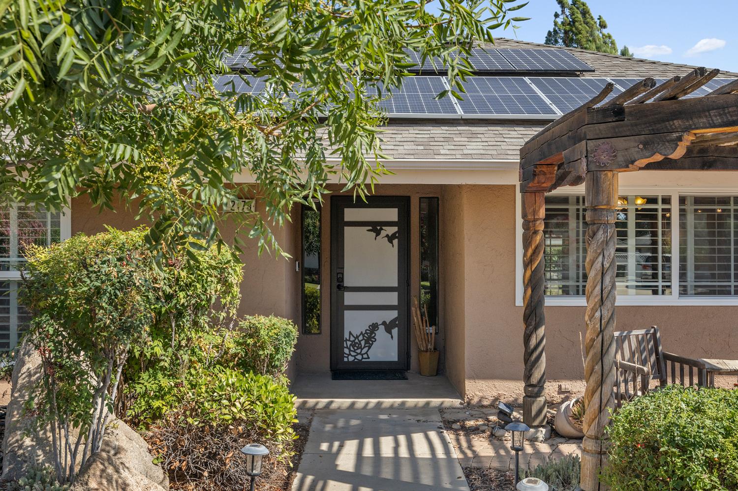 2179 Rall Avenue Clovis, CA 93611 - Photo 2 of 54 a front view of a house with garden