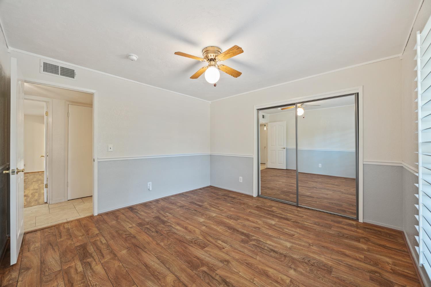 2179 Rall Avenue Clovis, CA 93611 - Photo 26 of 54 a view of empty room with wooden floor