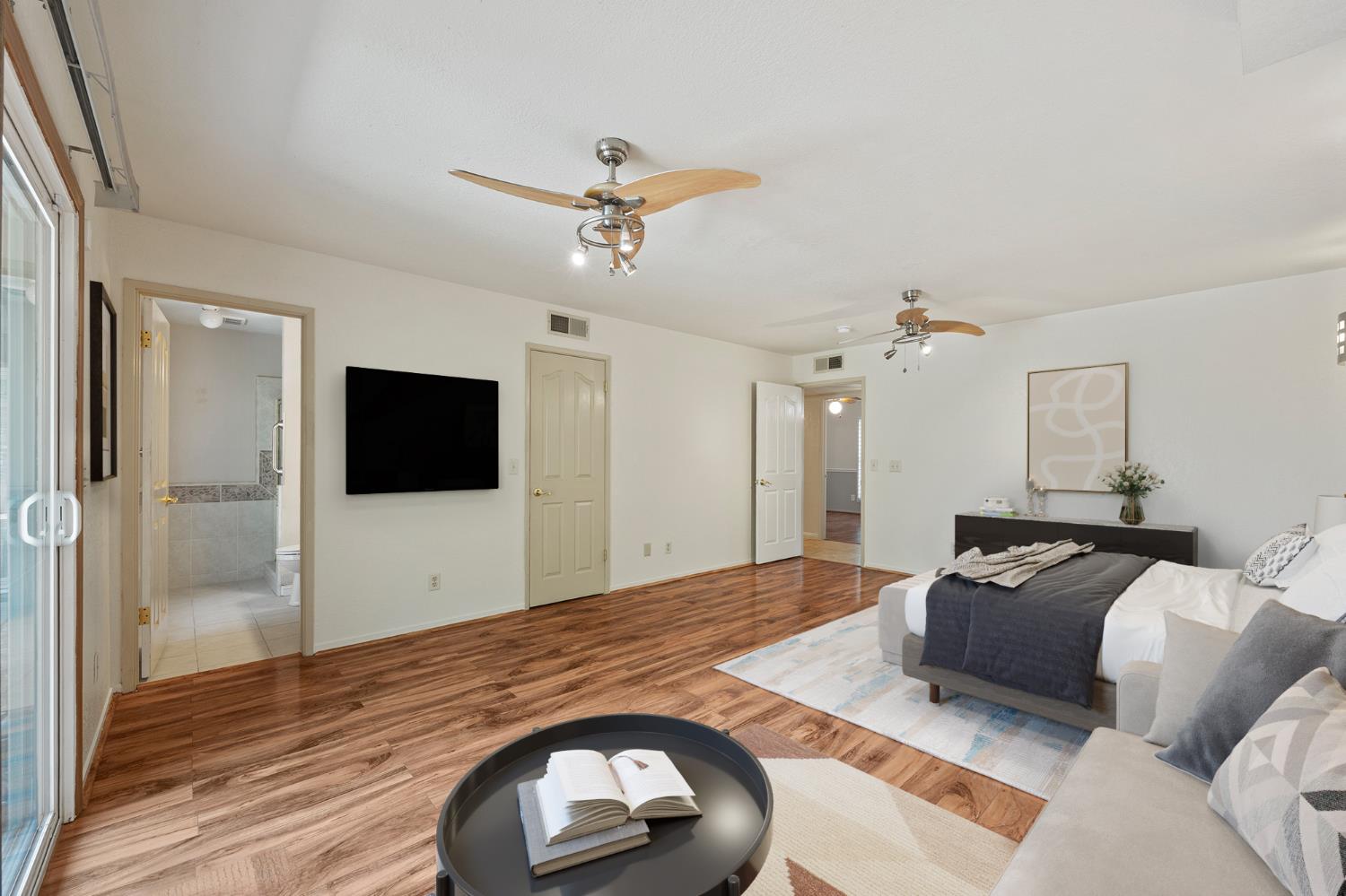 2179 Rall Avenue Clovis, CA 93611 - Photo 47 of 54 a bedroom with a bed and a flat screen tv