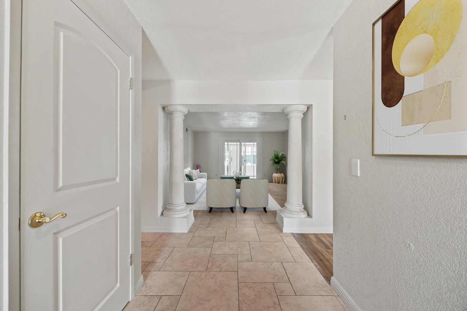 2179 Rall Avenue Clovis, CA 93611 - Photo 54 of 54 a living room with a baby crib furniture and a floor to ceiling window