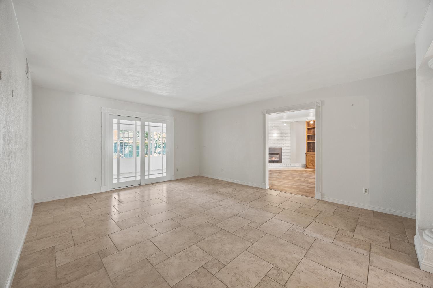 2179 Rall Avenue Clovis, CA 93611 - Photo 8 of 54 a view of an empty room with a window