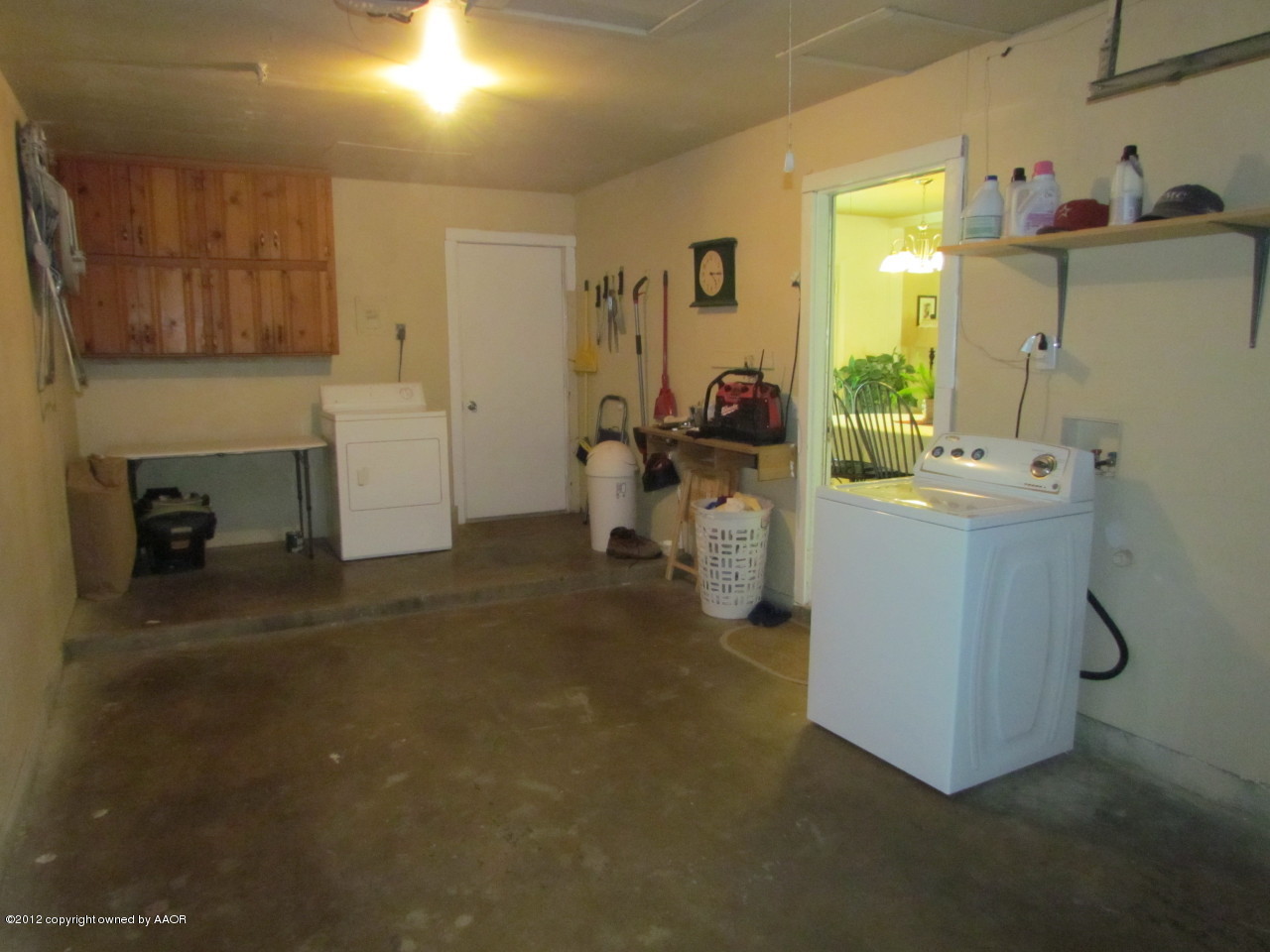 5313 Parker Street Amarillo, TX 79110 - Photo 12 of 26 a room with storage and utility