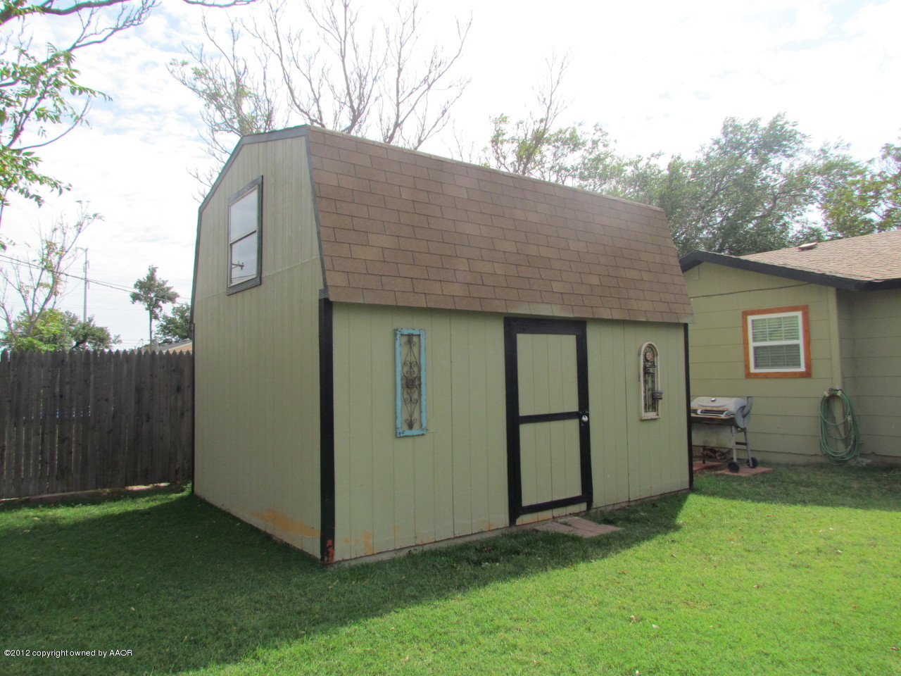 5313 Parker Street Amarillo, TX 79110 - Photo 25 of 26 a view of a house with backyard