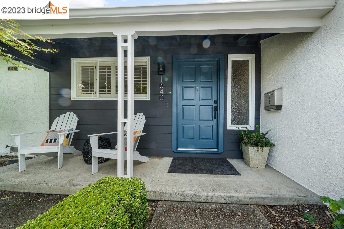 1540 Bockman Road San Lorenzo, CA 94580 - Photo 1 of 1 a view of a patio with table and chairs and potted plants