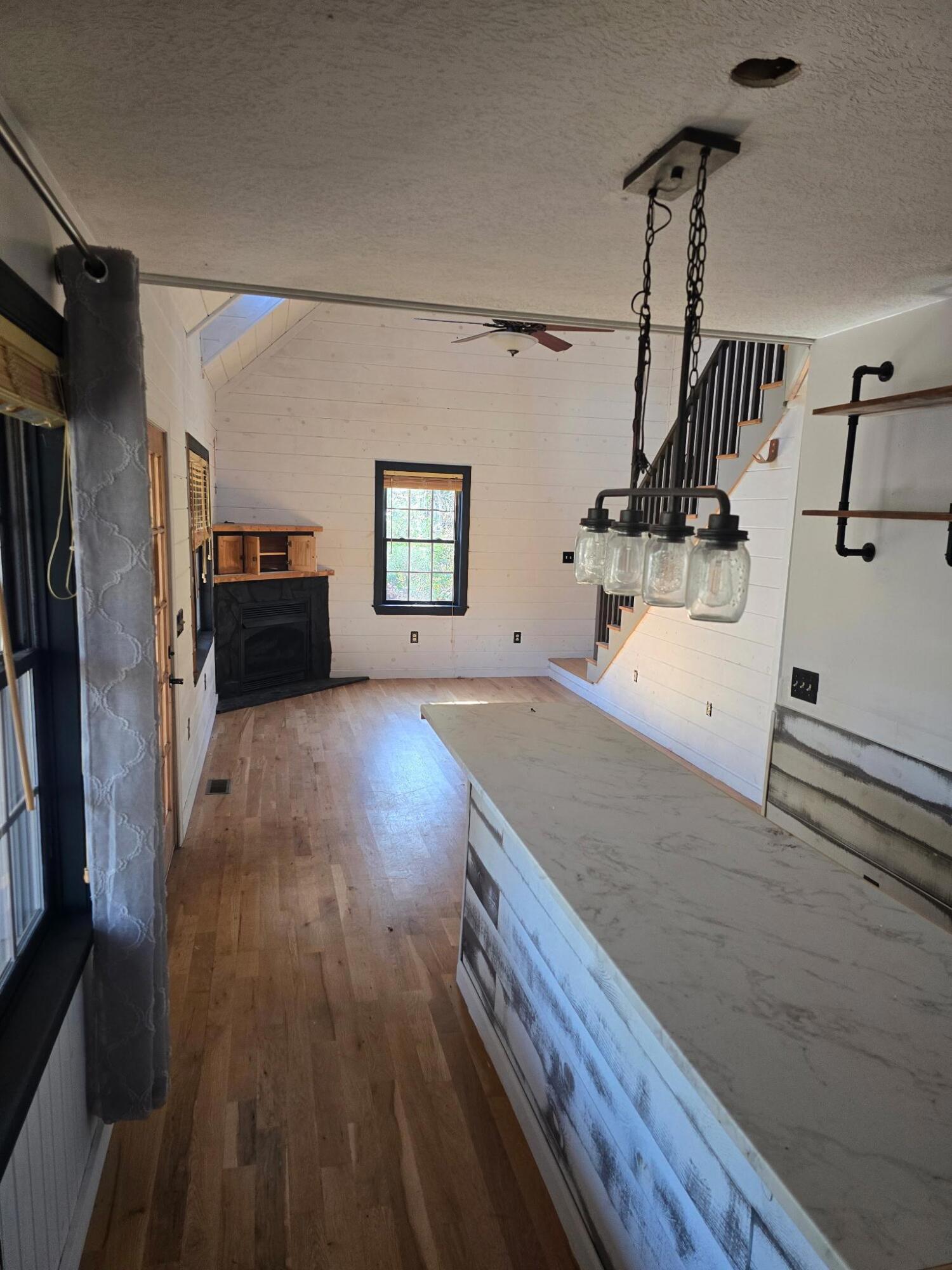 102 Flint Ridge Trail Fancy Gap, VA 24328 - Photo 12 of 26 a view of a living room and hardwood floor