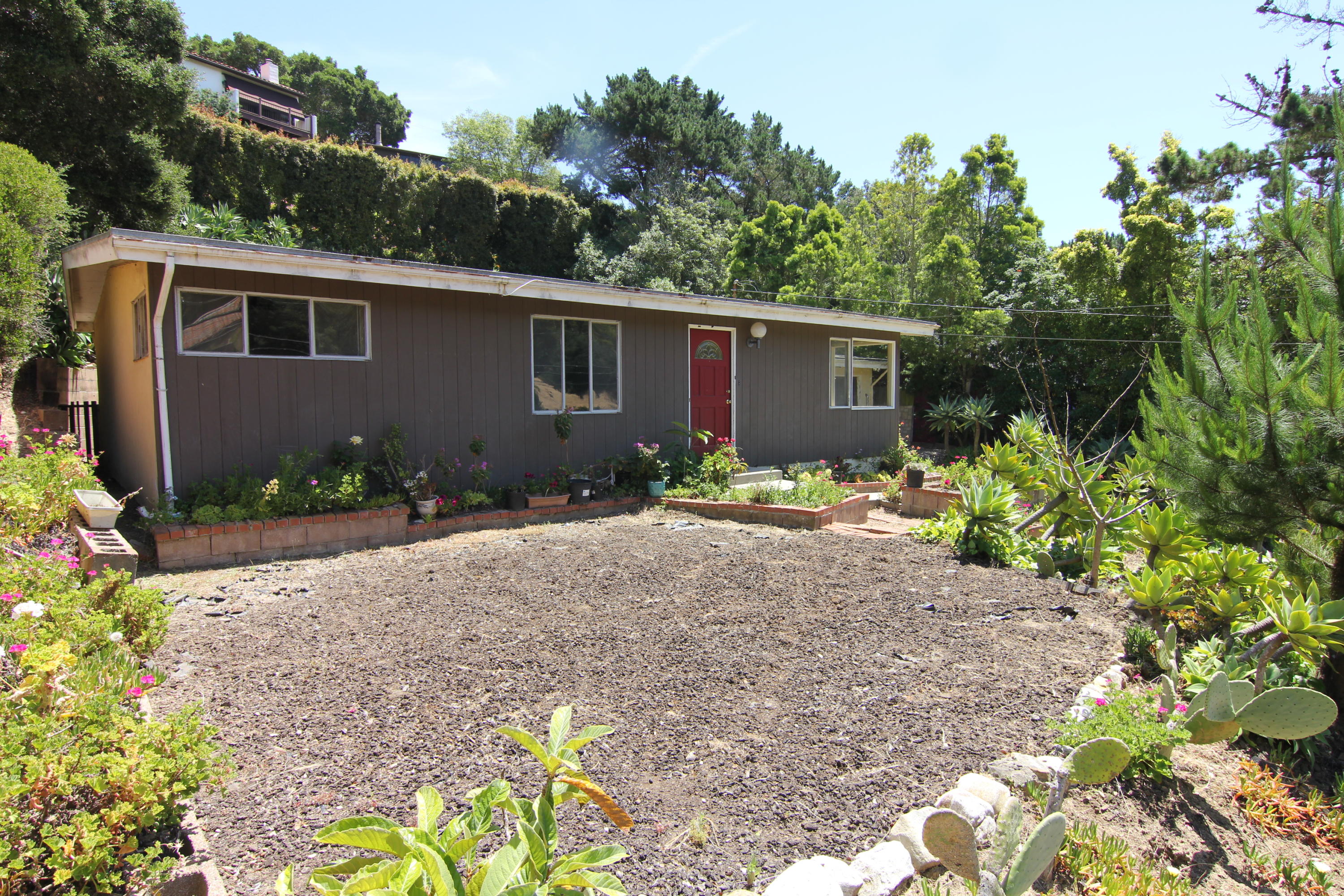 912 Fellowship Road Santa Barbara, CA 93109 - Photo 11 of 16 a house with lots of trees in the background