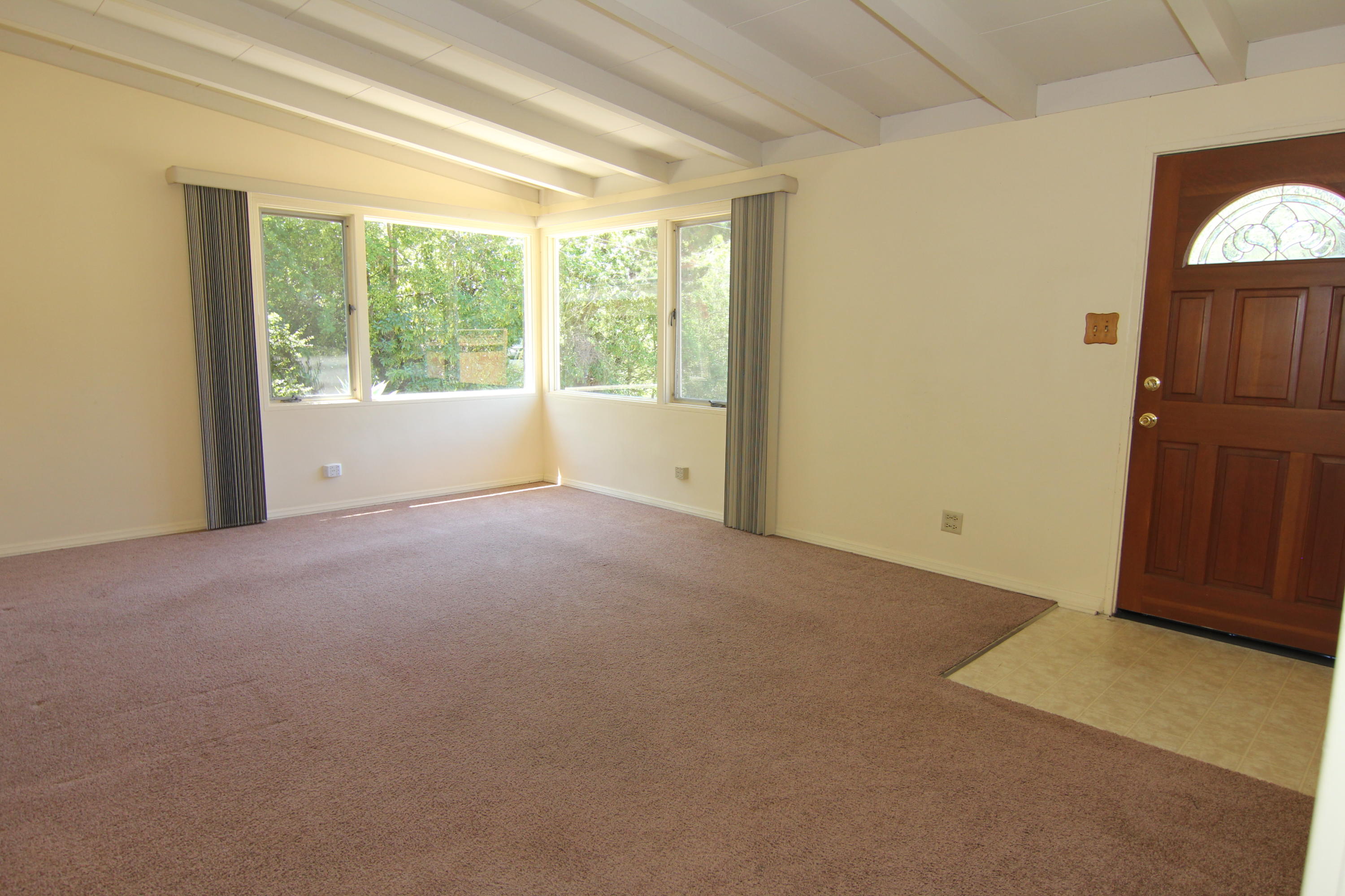 912 Fellowship Road Santa Barbara, CA 93109 - Photo 2 of 16 a view of an empty room with a window