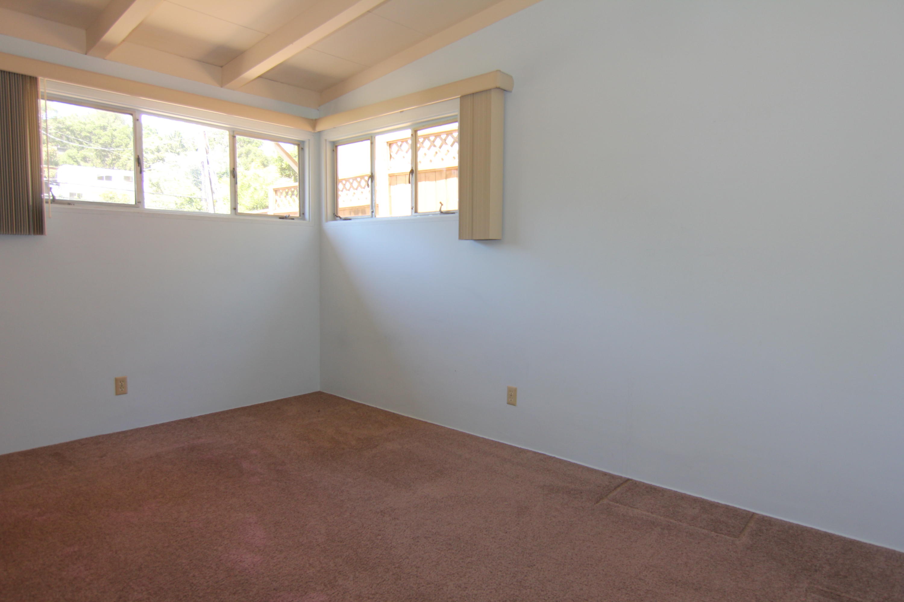 912 Fellowship Road Santa Barbara, CA 93109 - Photo 8 of 16 an empty room with a window