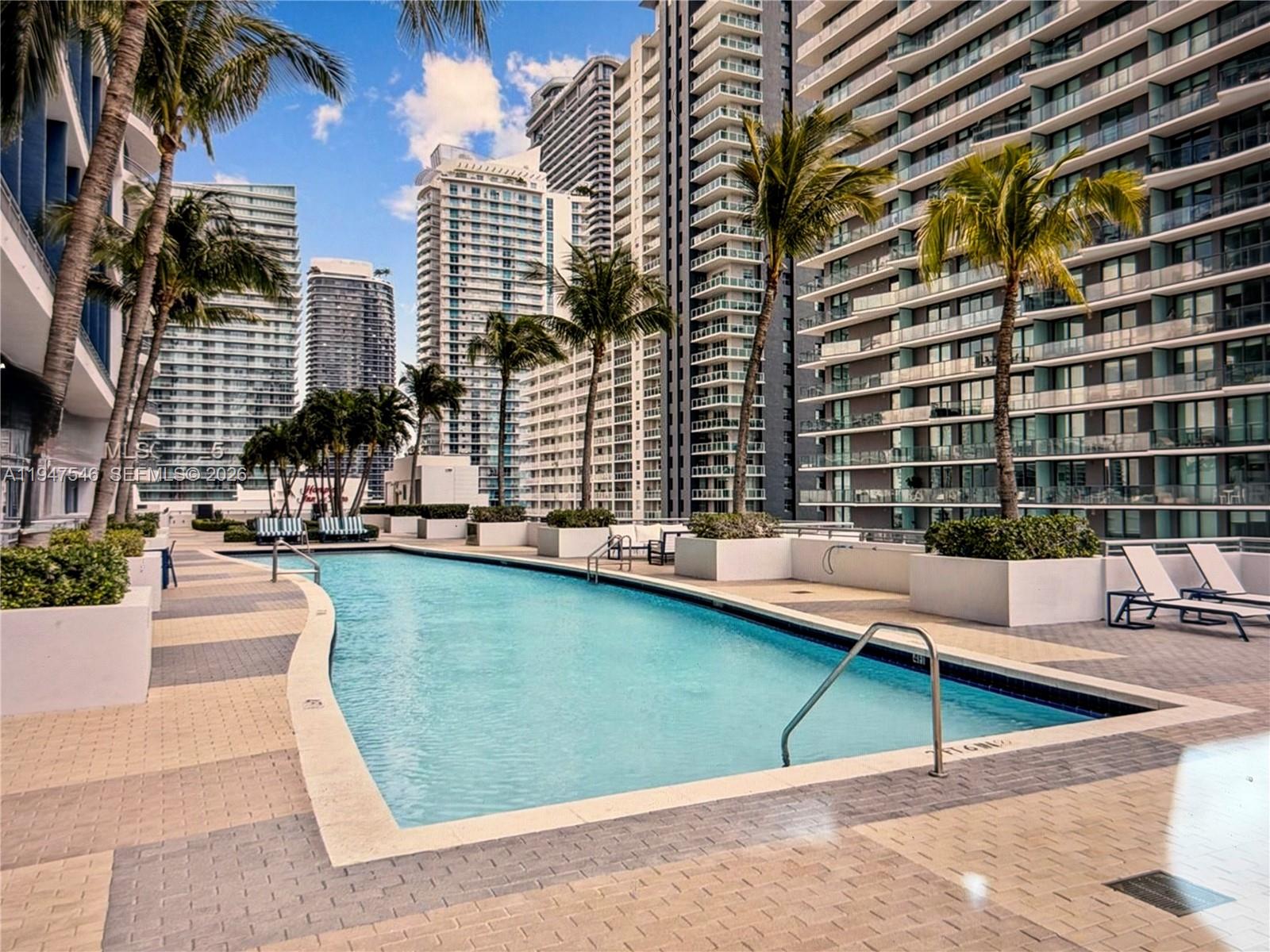60 Southwest 13th Street, Unit 3214 Miami, FL 33130 - Photo 13 of 13 swimming pool view with a outdoor seating