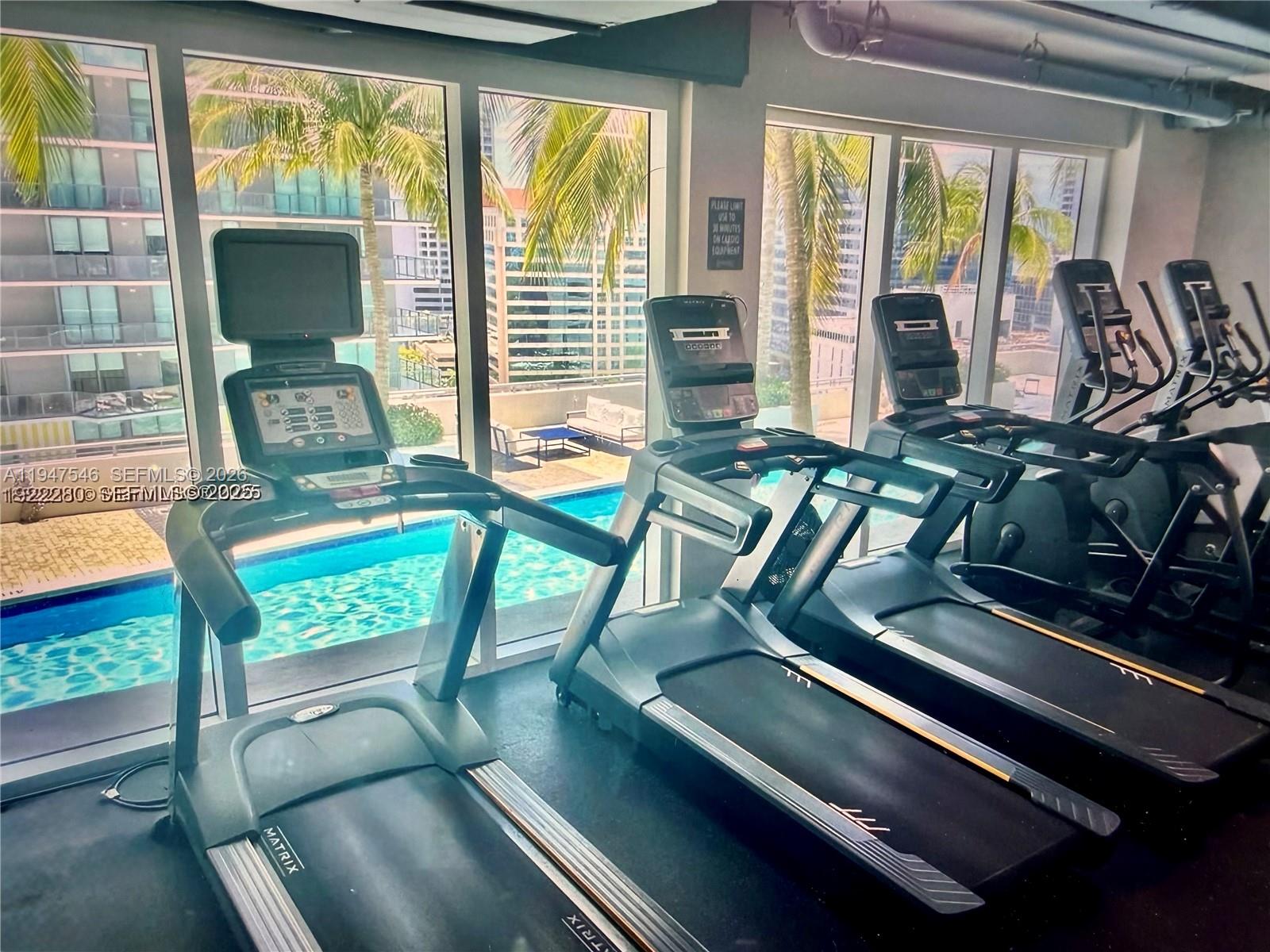 60 Southwest 13th Street, Unit 3214 Miami, FL 33130 - Photo 8 of 13 a view of a chairs and table in a room