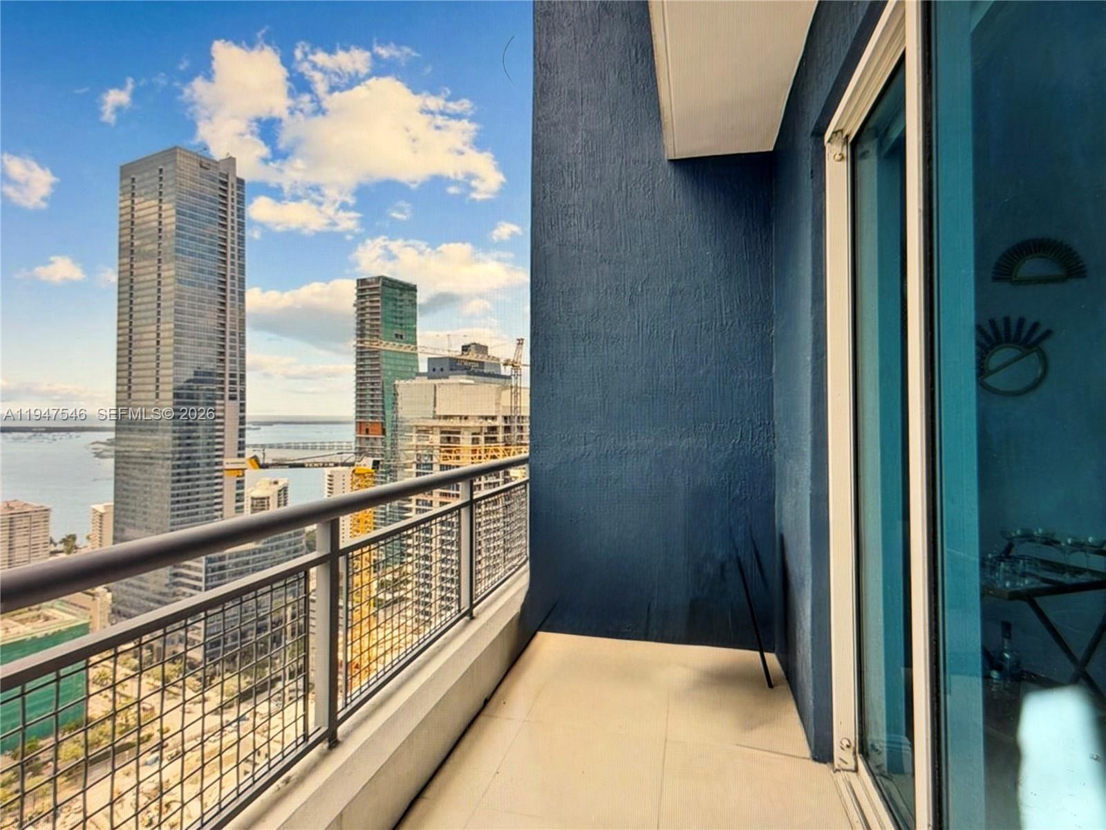 60 Southwest 13th Street, Unit 3214 Miami, FL 33130 - Photo 9 of 13 a view of balcony with furniture